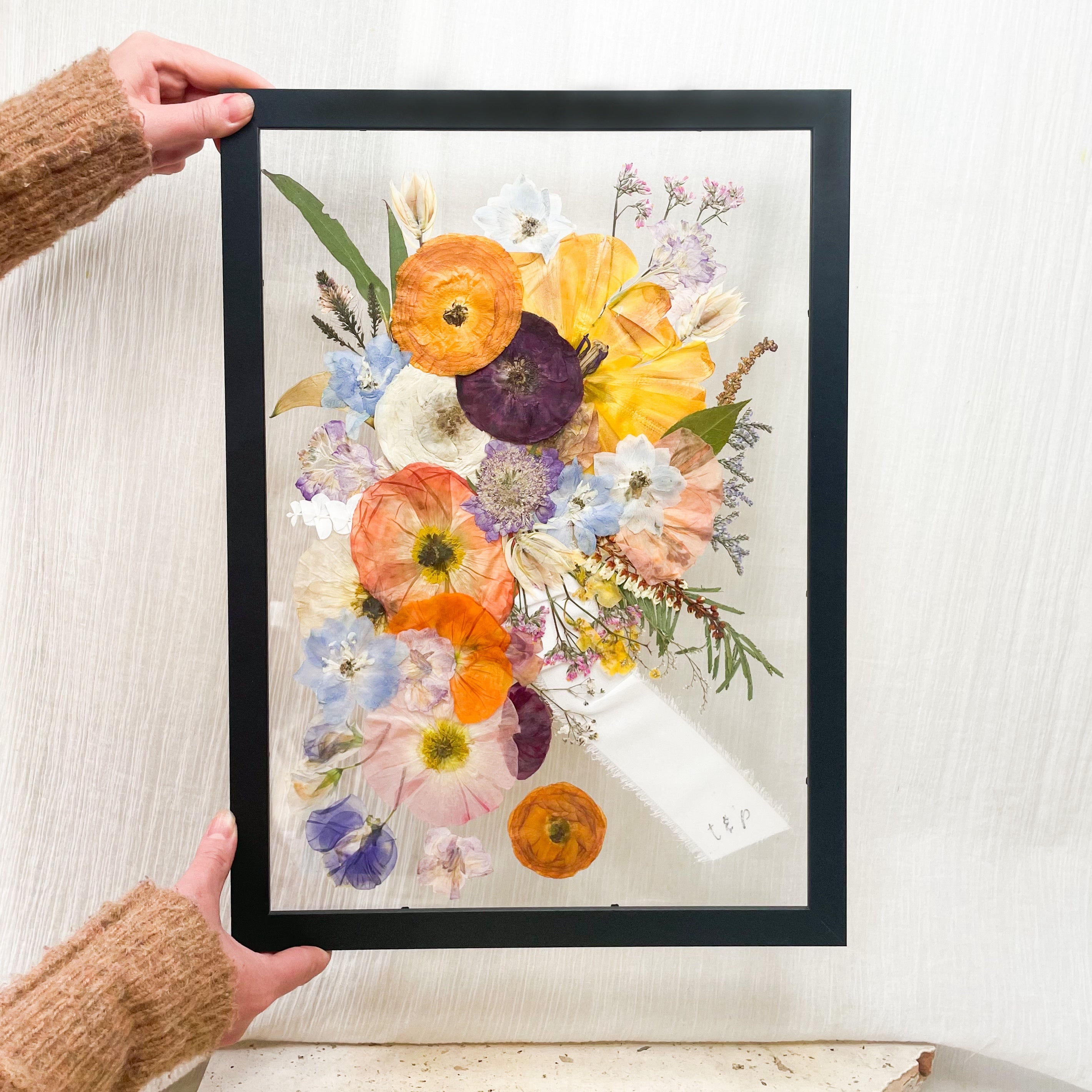 Preserved pressed wedding bouquet - custom wedding ribbon with initials set in a floating frame mount