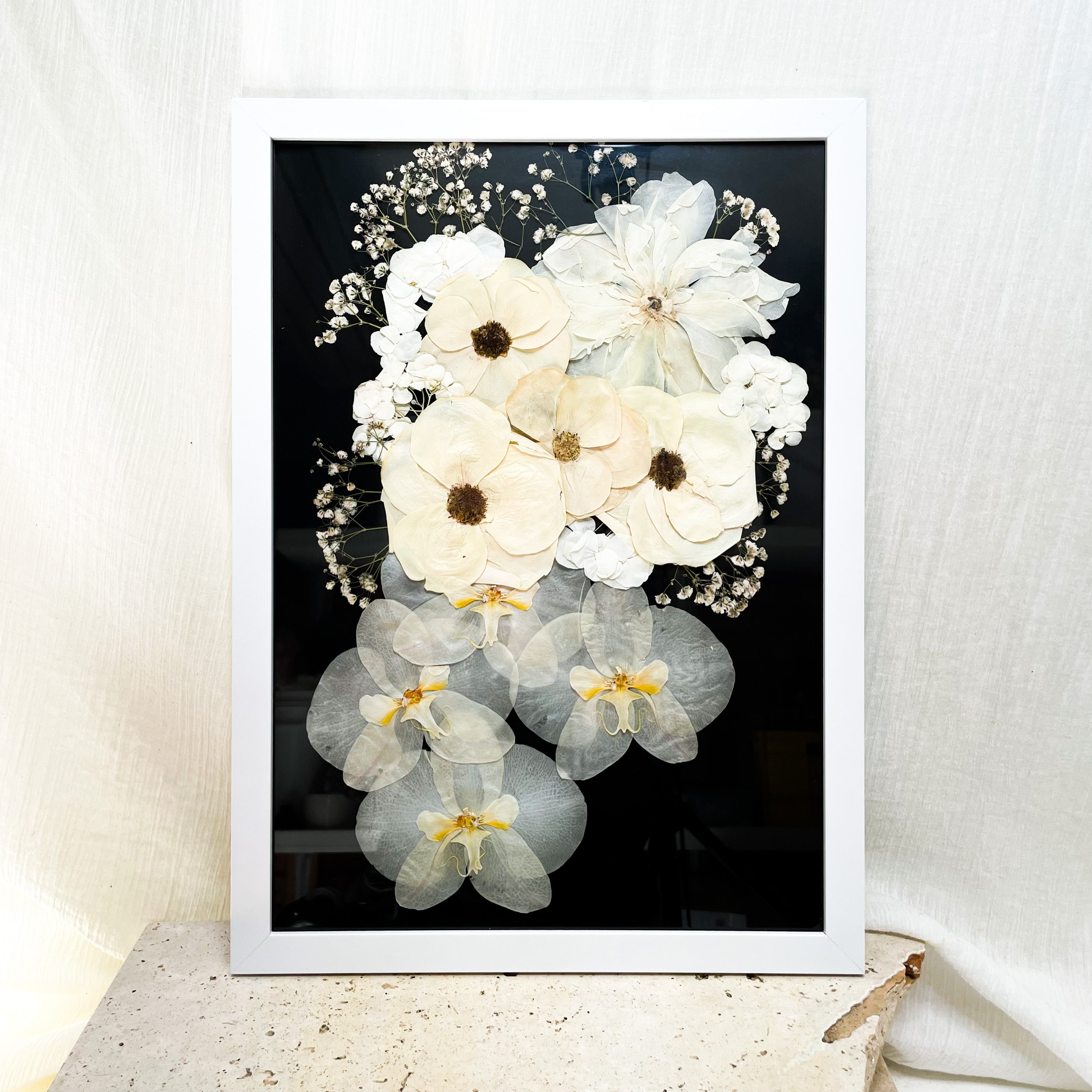 Preserved wedding bouquet - pressed flowers - white orchids roses baby’s breath set in a white frame with black mat board - pressed flower framing