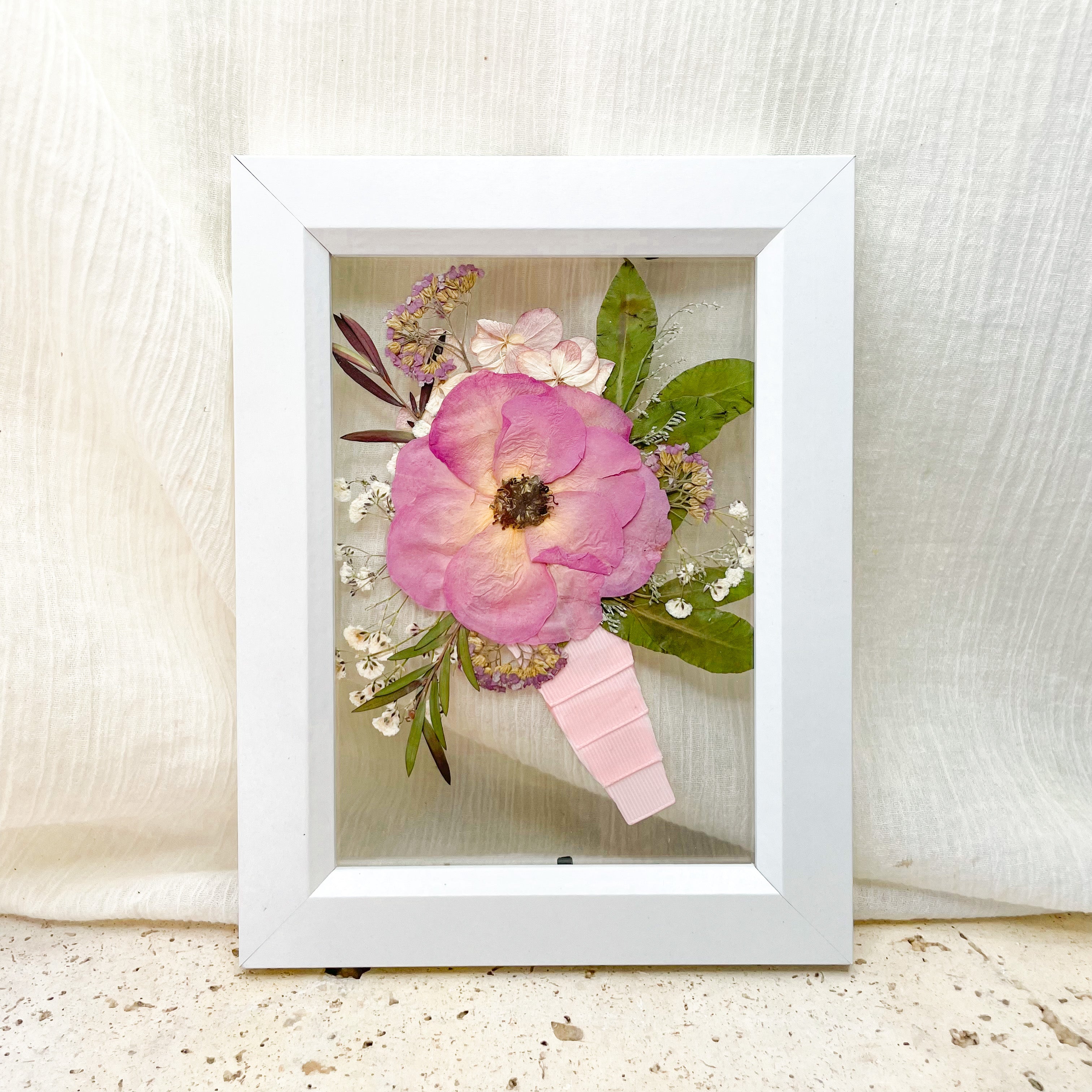 Preserved pressed wedding flowers buttonhole set in floating frame mount