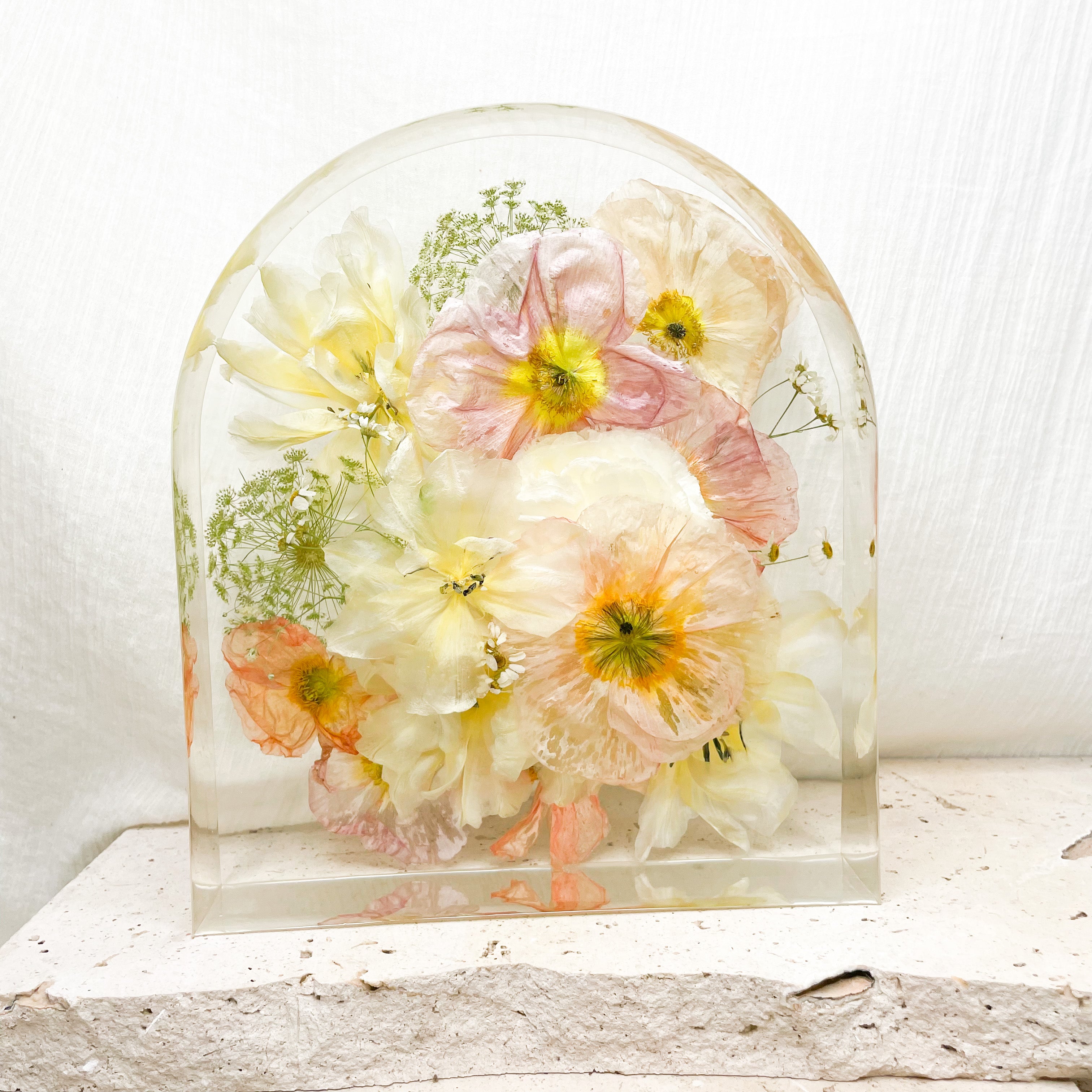 Colourful preserved wedding bouquet in extra large resin arch block