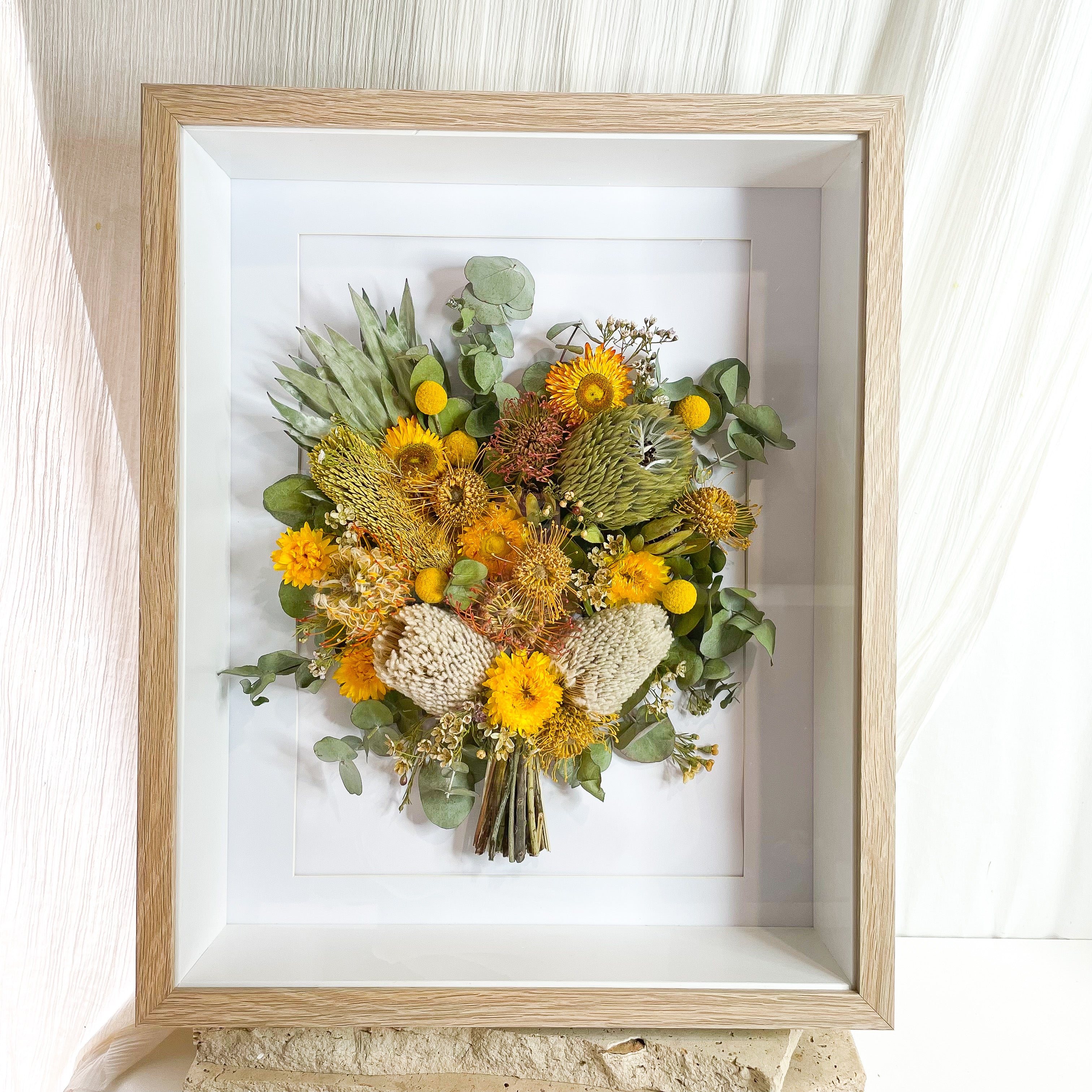 custom-flower-framing-3d-shadow-box
Preserved native green yellow wedding bouquet set in 40x50cm oak 3d frame