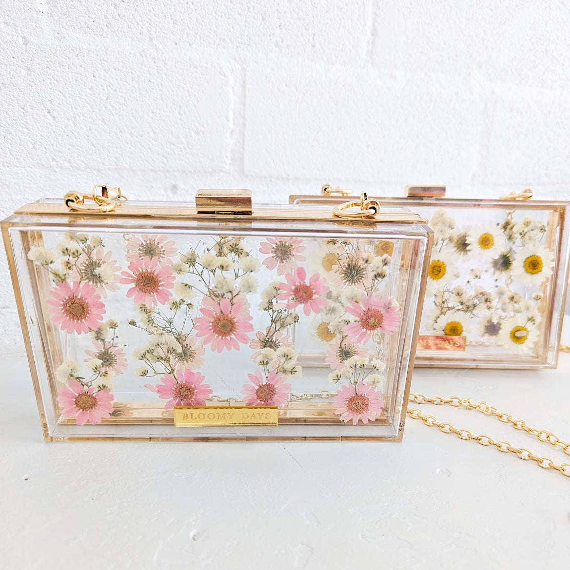 Pink best sale floral clutch